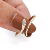 Modern open snake ring with marquise diamond