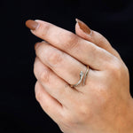 Close-up of marquise diamond eye on snake-inspired ring