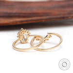 Yellow gold cluster engagement ring lifestyle image