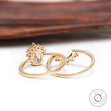 Yellow gold cluster engagement ring lifestyle image