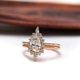 Rose gold pear diamond cluster ring with matching band