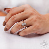 Close-up of pear diamond surrounded by marquise and round accent stones