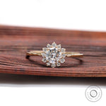 Round lab grown diamond halo ring in 14K yellow gold front view