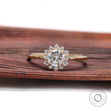 Round lab grown diamond halo ring in 14K yellow gold front view