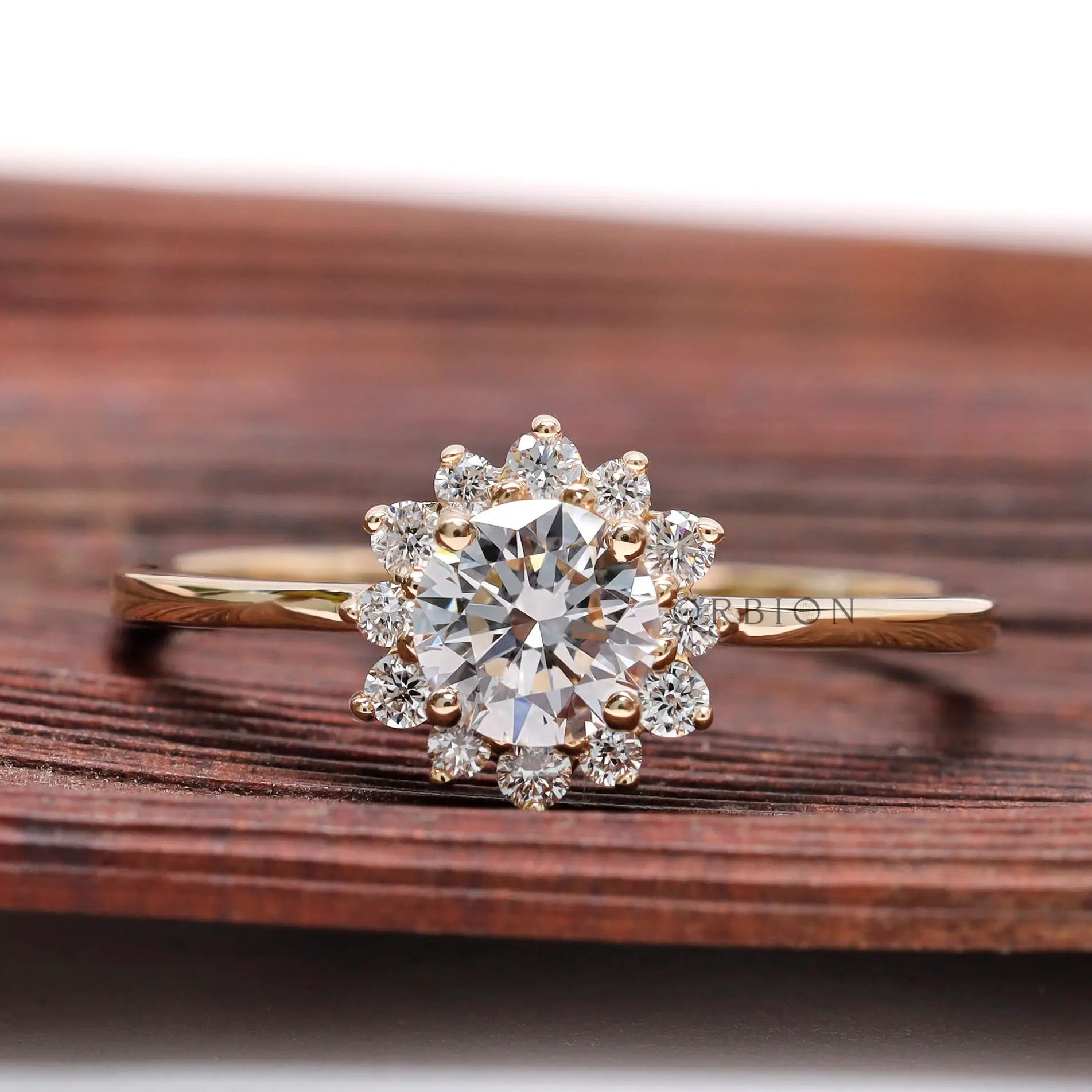 Round lab grown diamond halo ring in 14K yellow gold front view