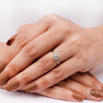 On-hand view of yellow gold lab grown diamond halo ring