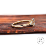 Yellow gold oval diamond cluster ring