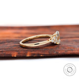 Yellow gold oval diamond cluster ring
