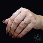 Oval lab grown diamond cluster ring worn on hand