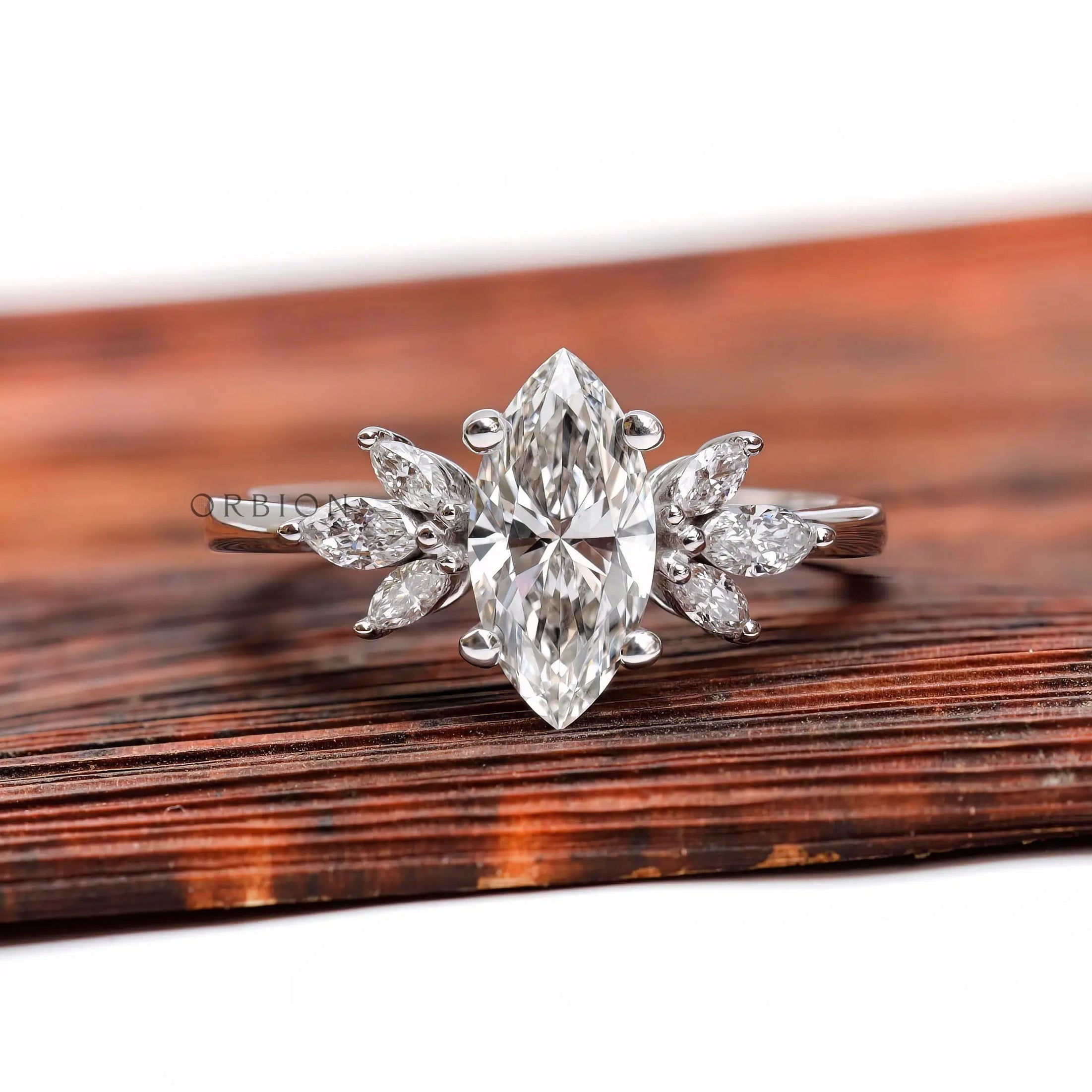 Marquise lab grown diamond cluster engagement ring in 14K white gold