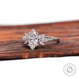 Marquise cut lab grown diamond cluster ring angled view
