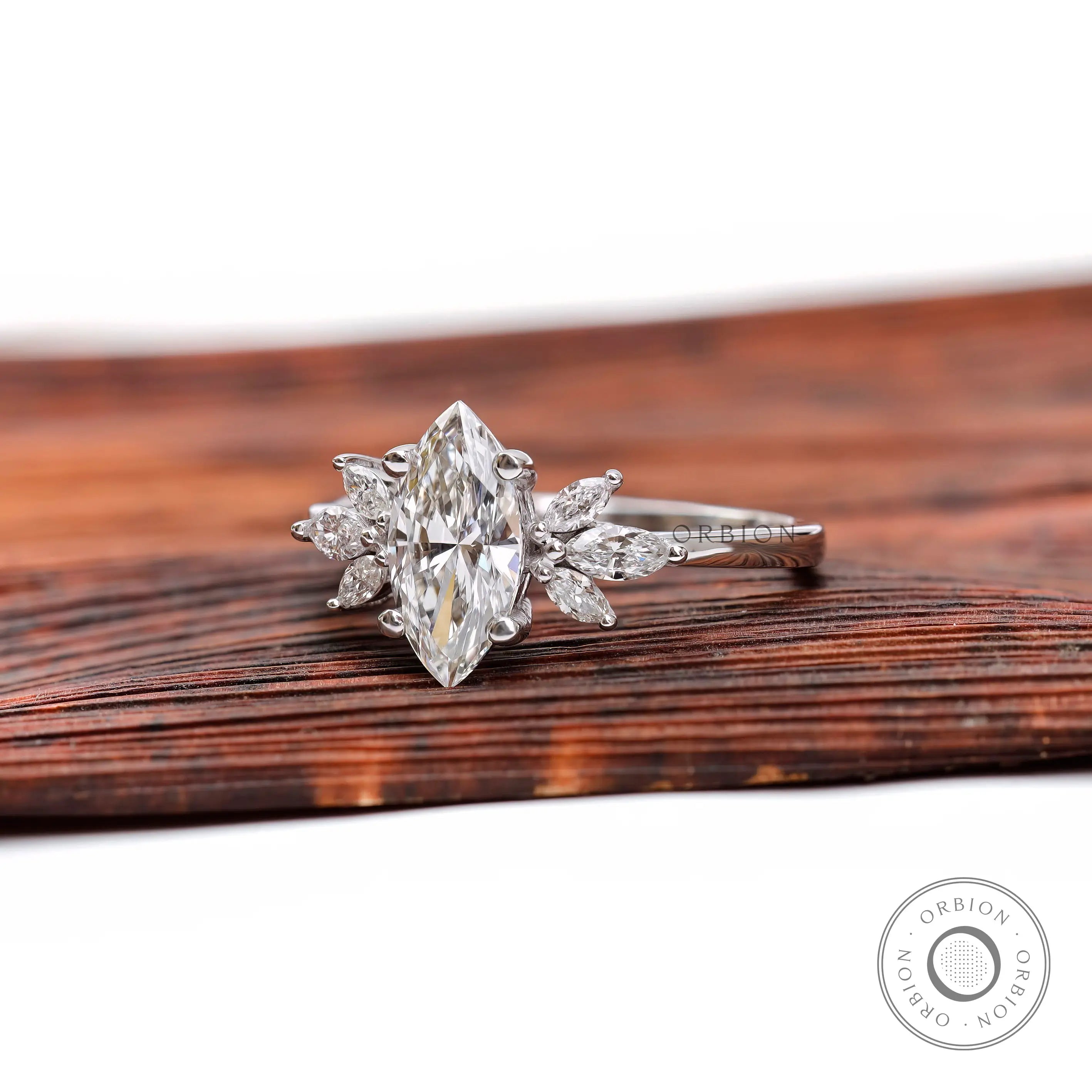 Marquise cut lab grown diamond cluster ring angled view
