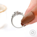 Side profile of marquise cluster engagement ring