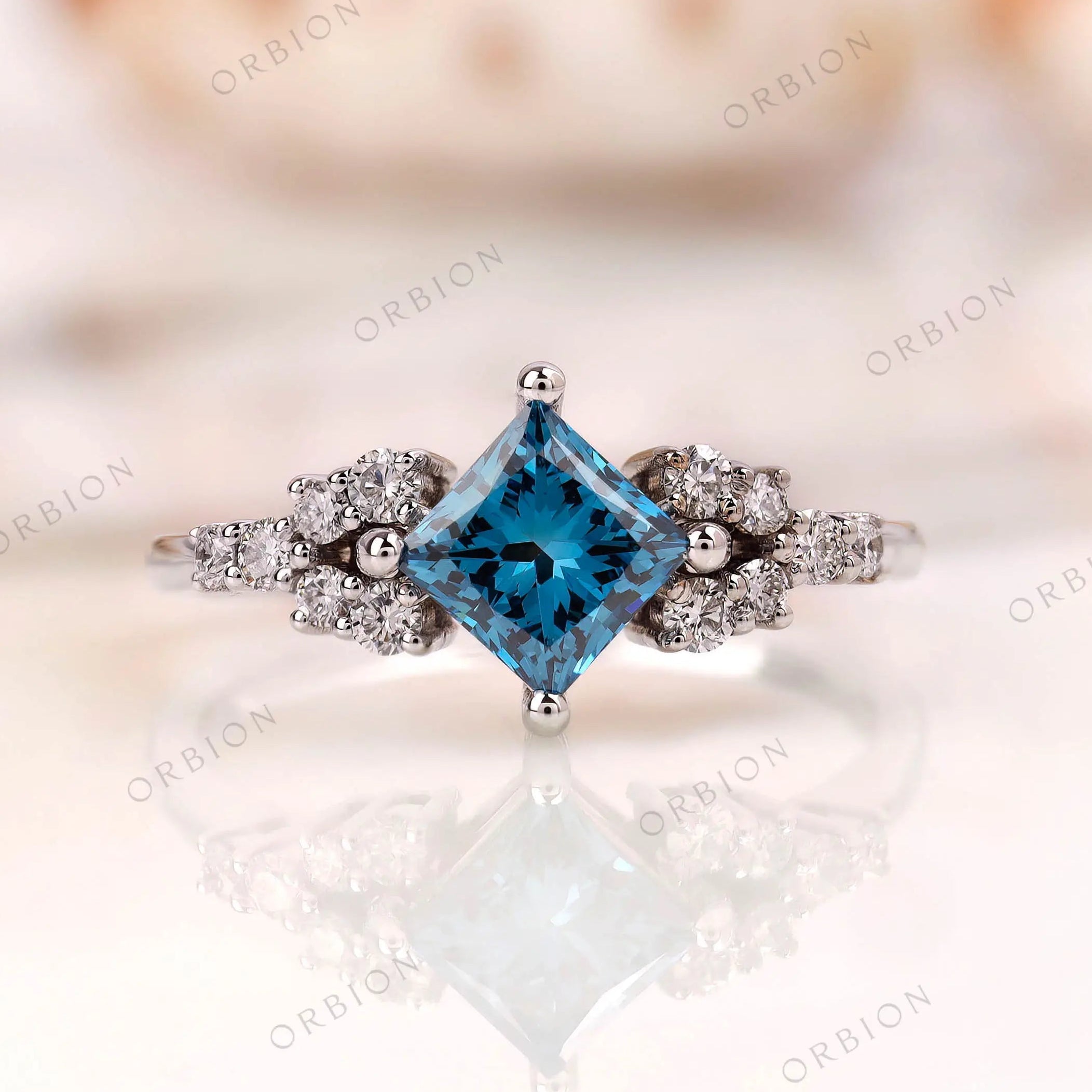 Princess cut fancy vivid blue lab grown diamond cluster engagement ring in 14K white gold