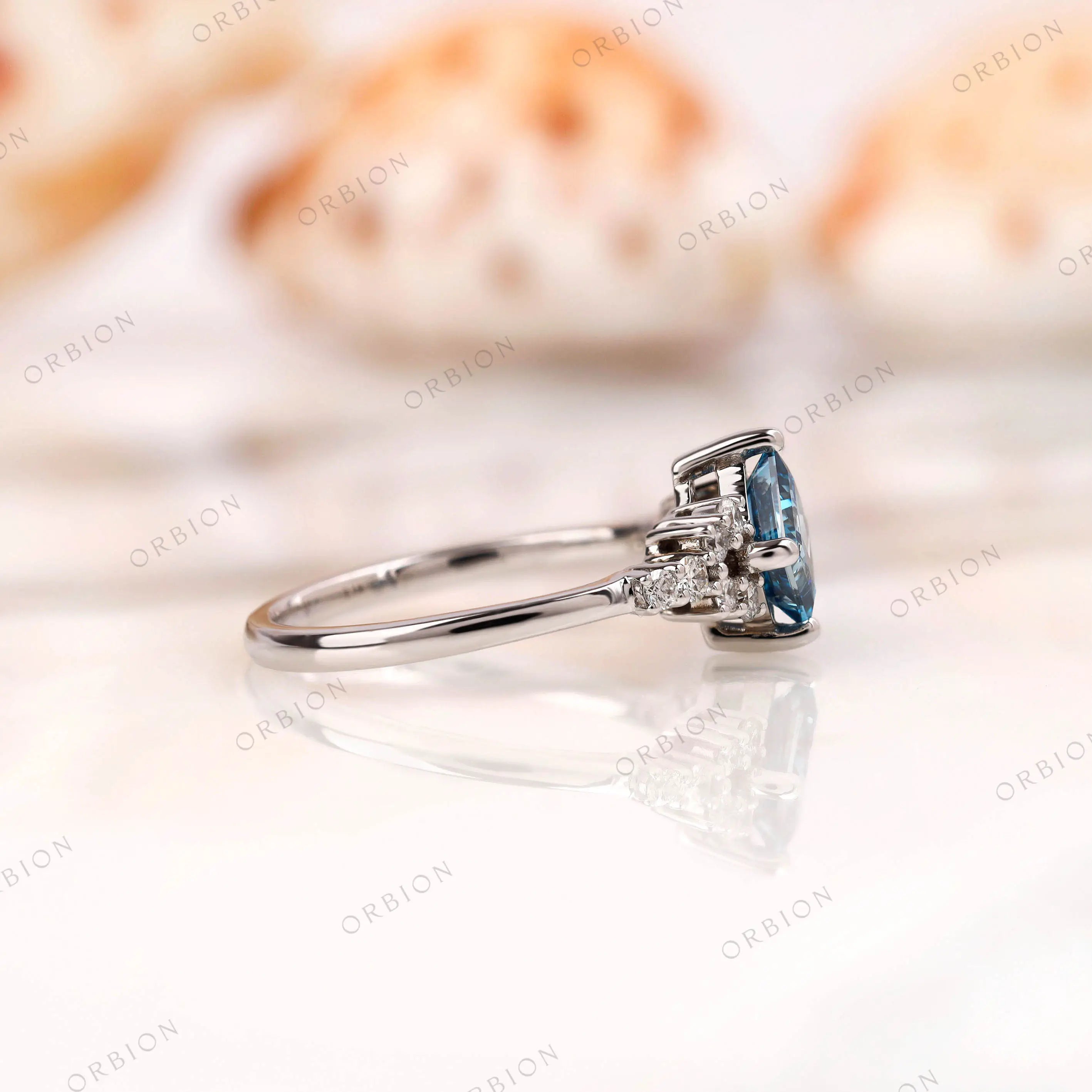 Wide band white gold cluster diamond engagement ring