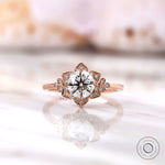 Floral halo lab grown diamond ring top view with rose gold petals
