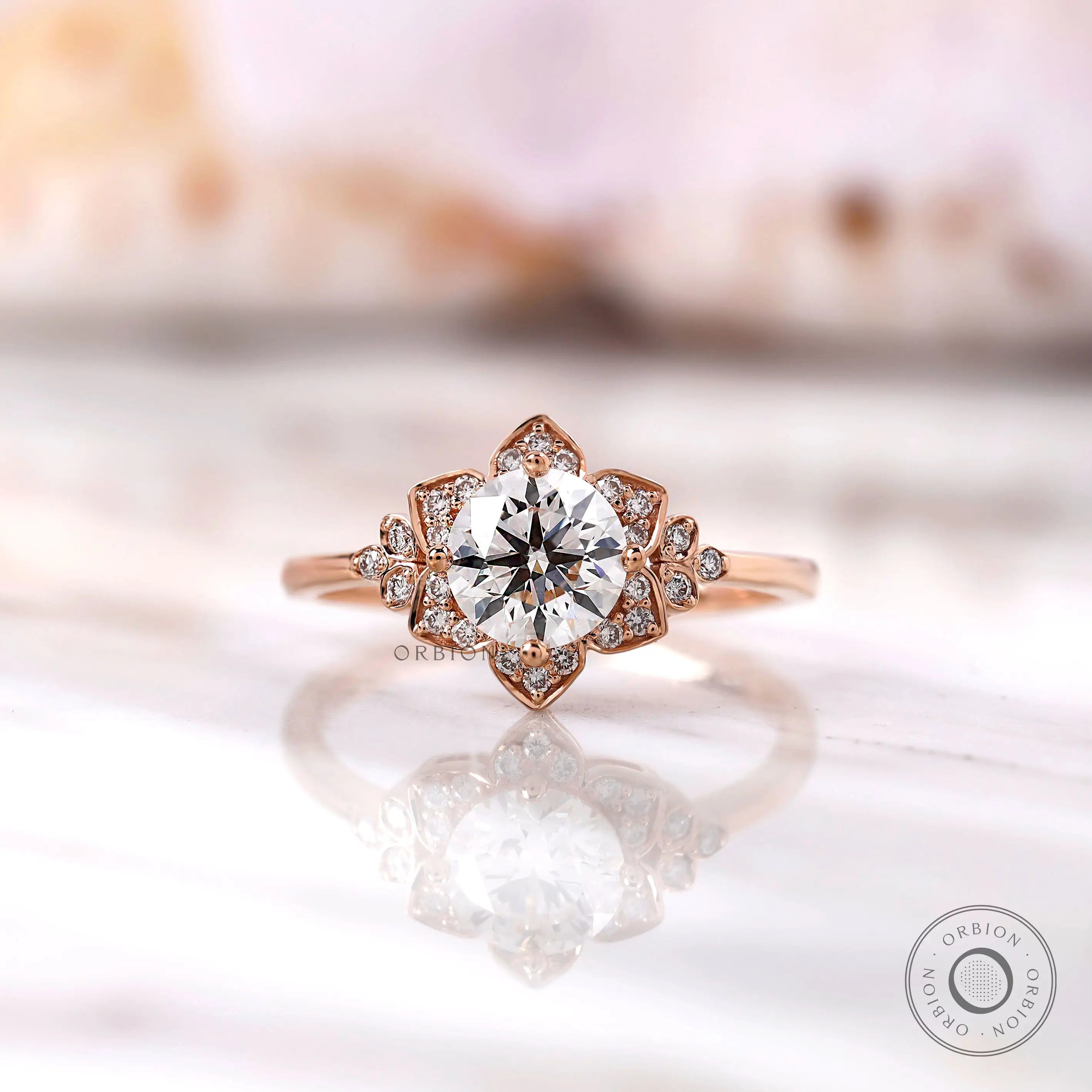 Floral halo lab grown diamond ring top view with rose gold petals