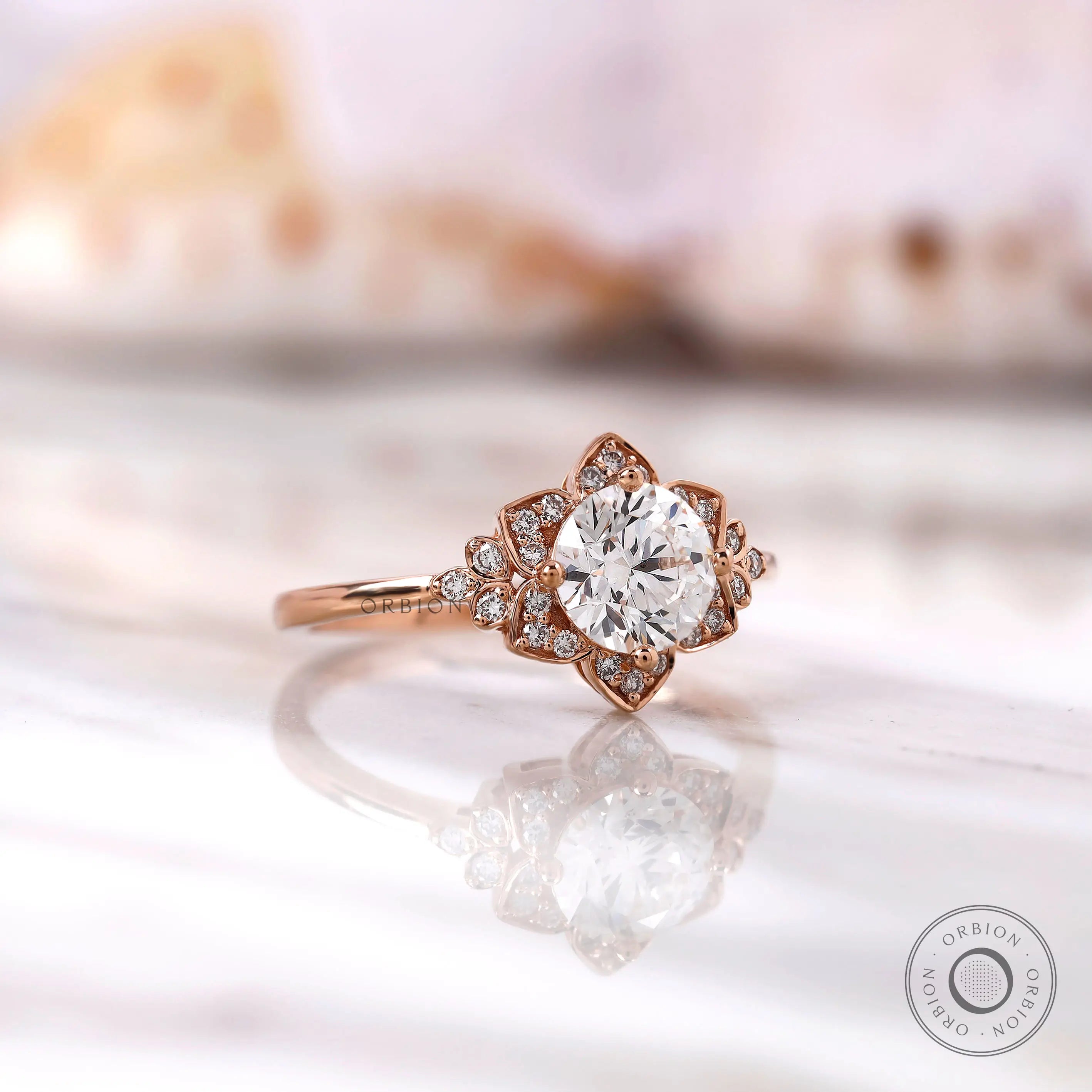 Round heart and arrow cut diamond halo ring close-up detailing