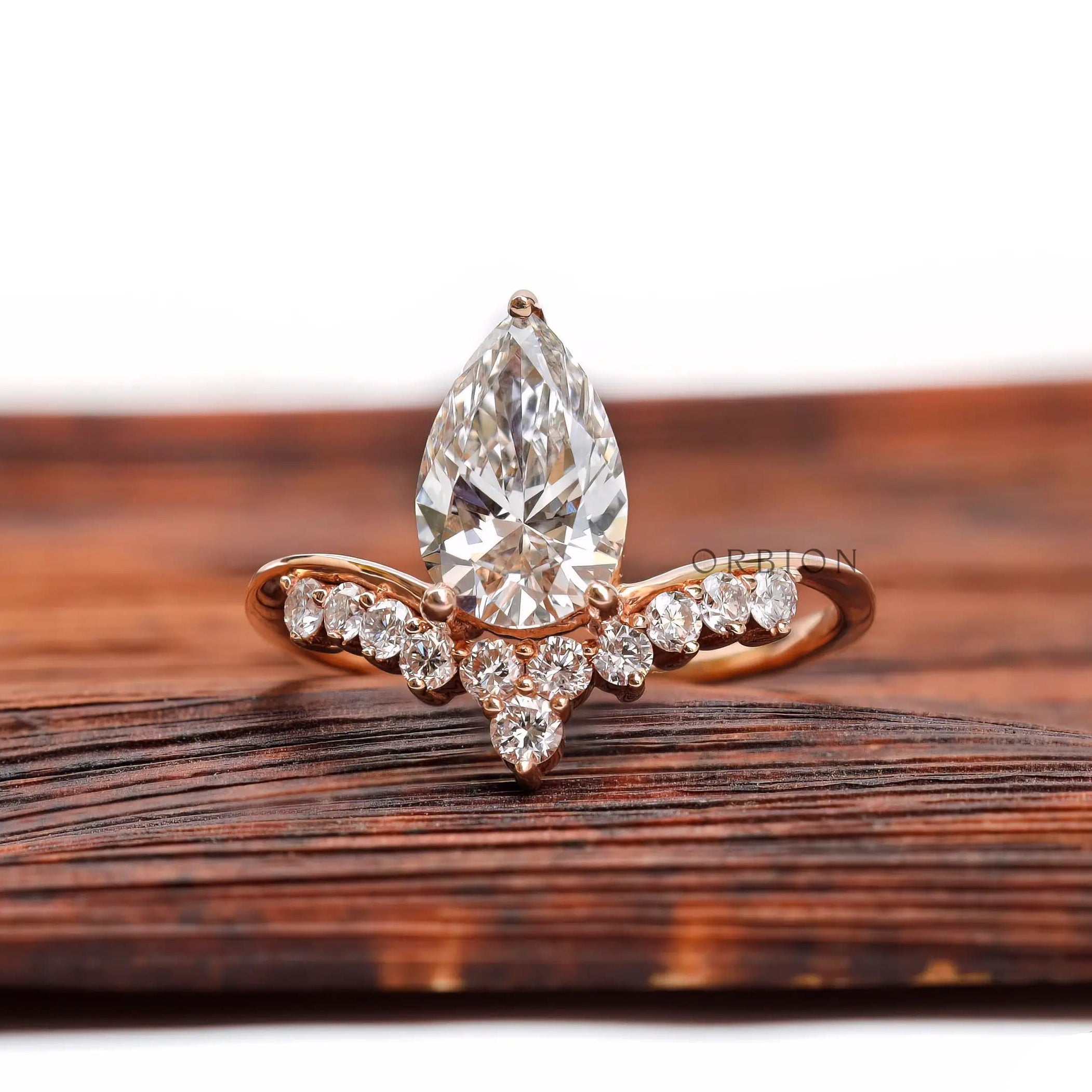 Pear cut lab grown diamond engagement ring in 14k rose gold