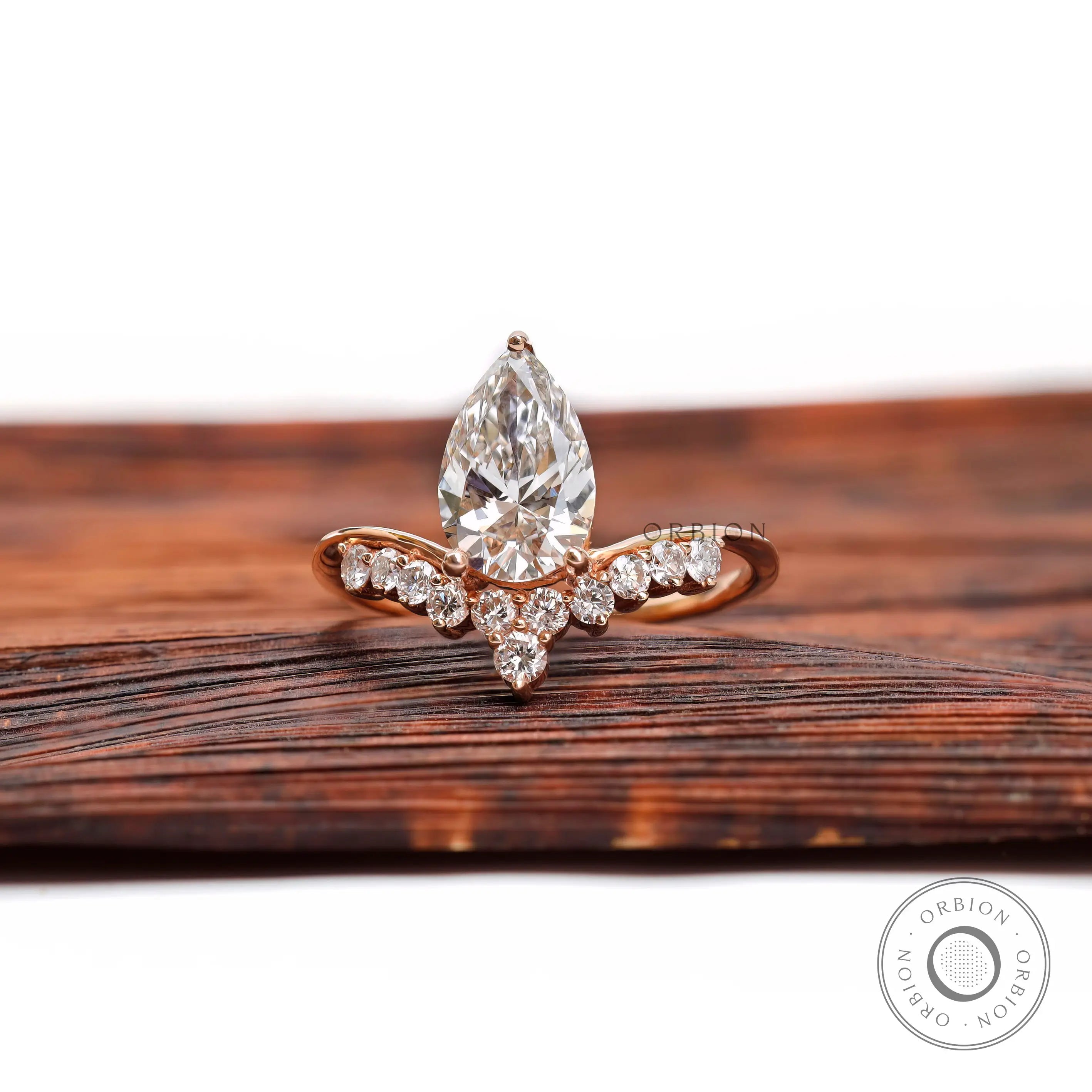 Pear cut lab grown diamond engagement ring in 14k rose gold