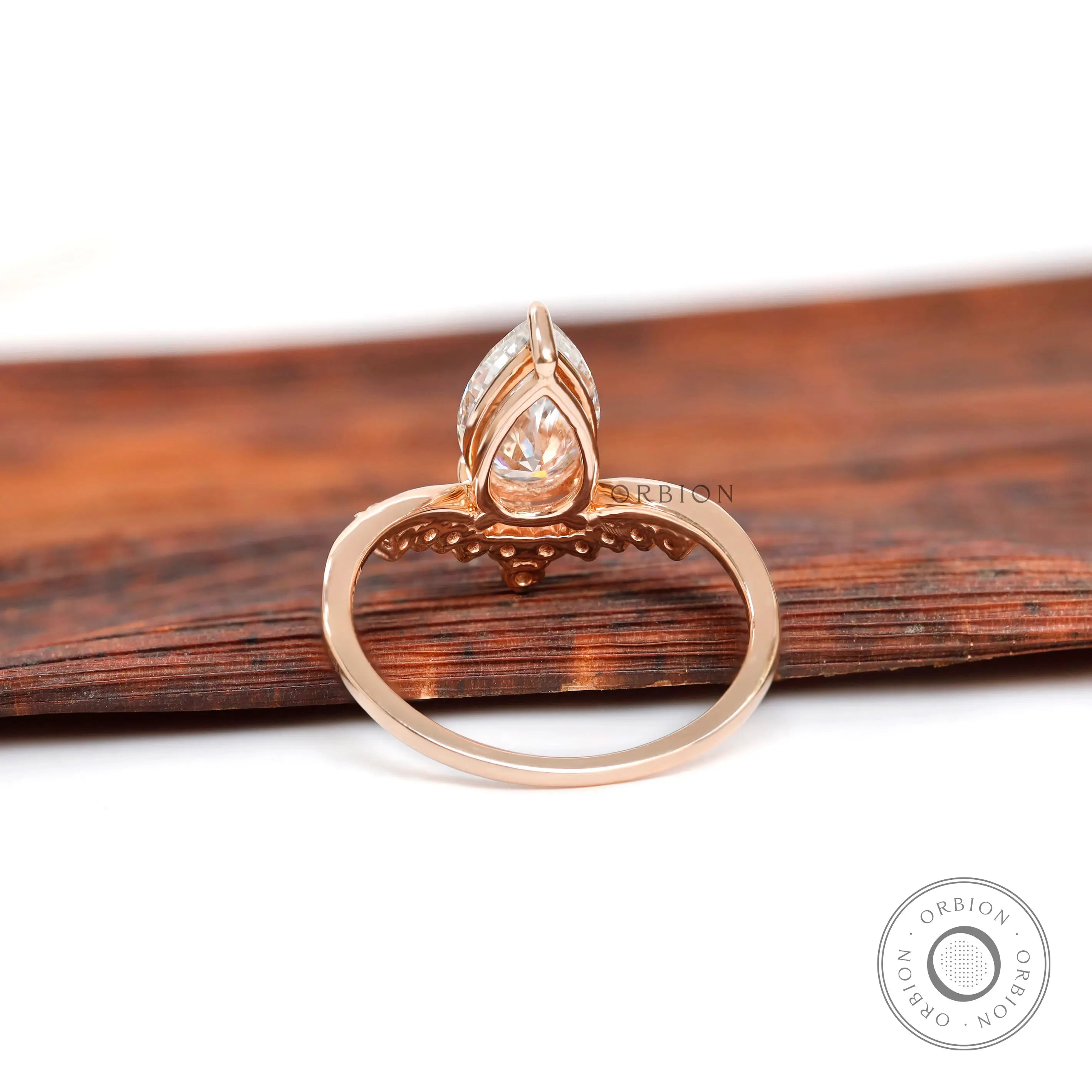 Asymmetrical diamond engagement ring in rose gold