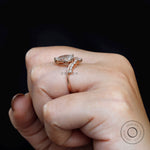 Tapered rose gold band with curved diamond accent