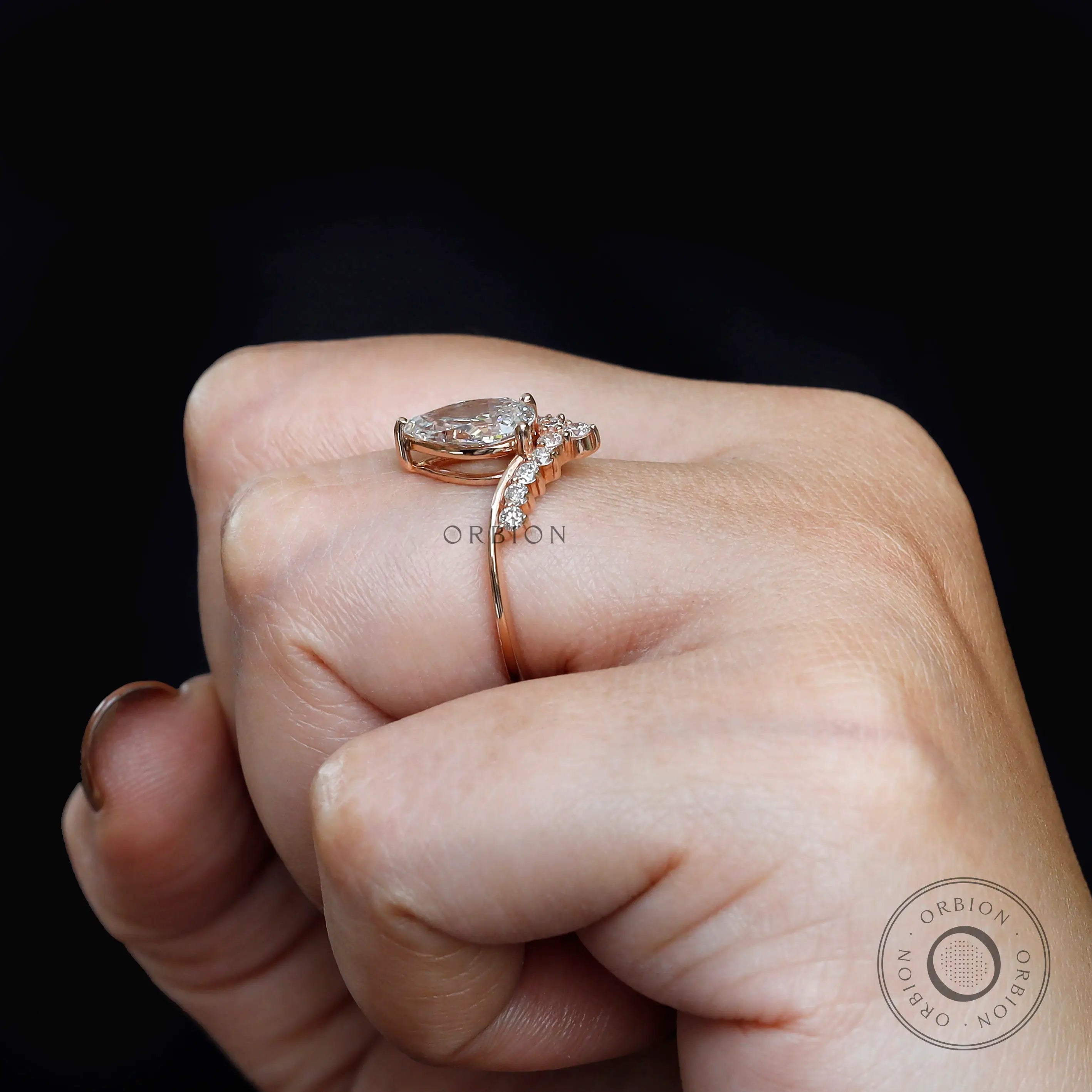 Tapered rose gold band with curved diamond accent