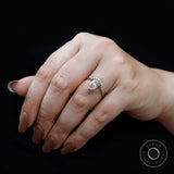 Pear lab grown diamond ring worn on hand