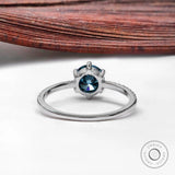 Round blue diamond solitaire ring