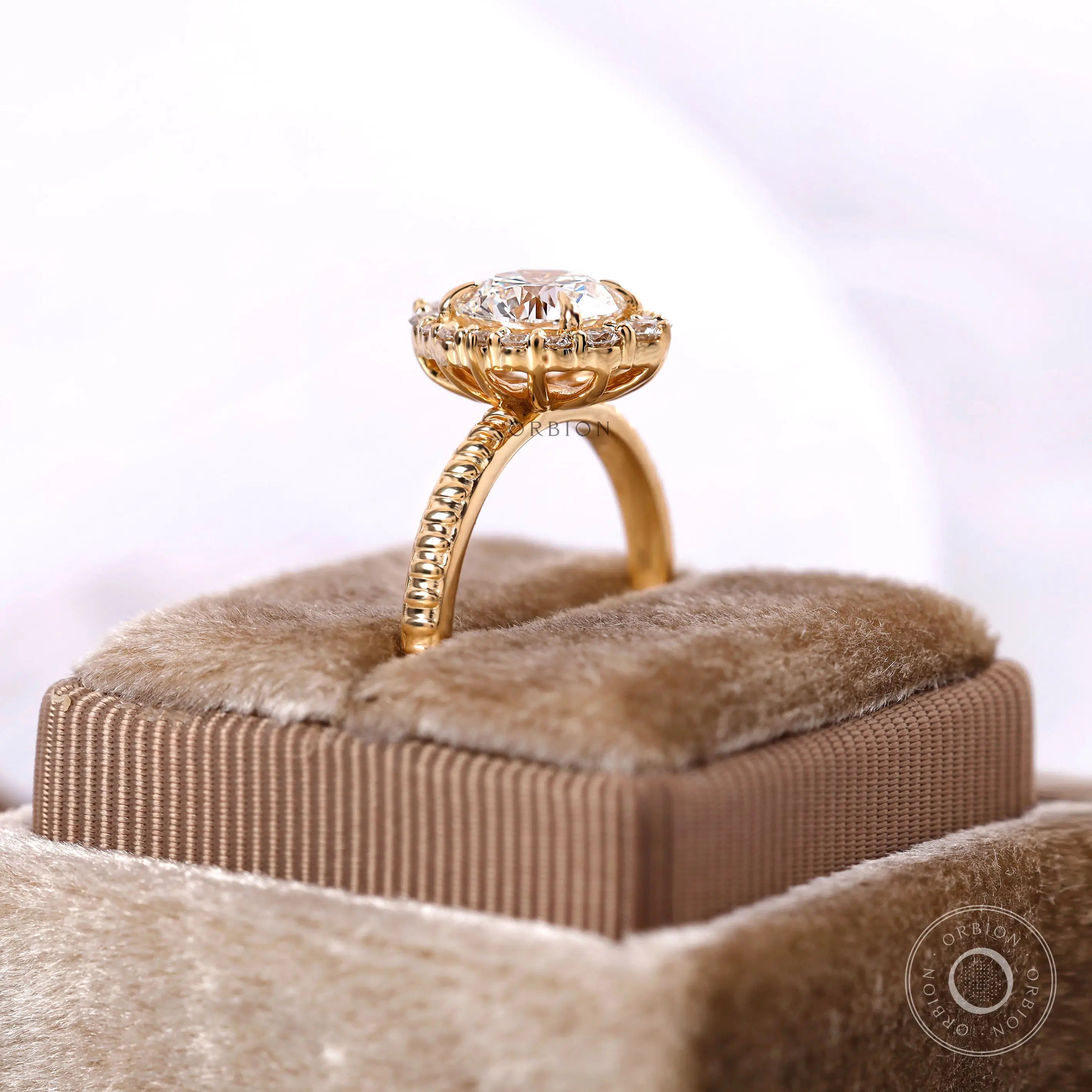 Detailed view of yellow gold band with refined finish