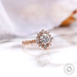 Rose gold halo diamond ring angled side view
