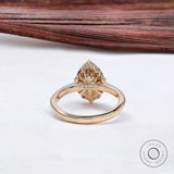 Close-up of pear brilliant cut diamond halo setting