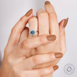 Floral halo blue diamond ring design