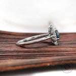 Blue diamond halo ring side profile
