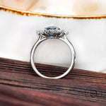Marquise and round diamond halo detailing