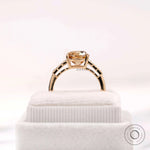 Three stone style moissanite ring with elongated cushion center