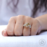Hand worn pear champagne moissanite engagement ring