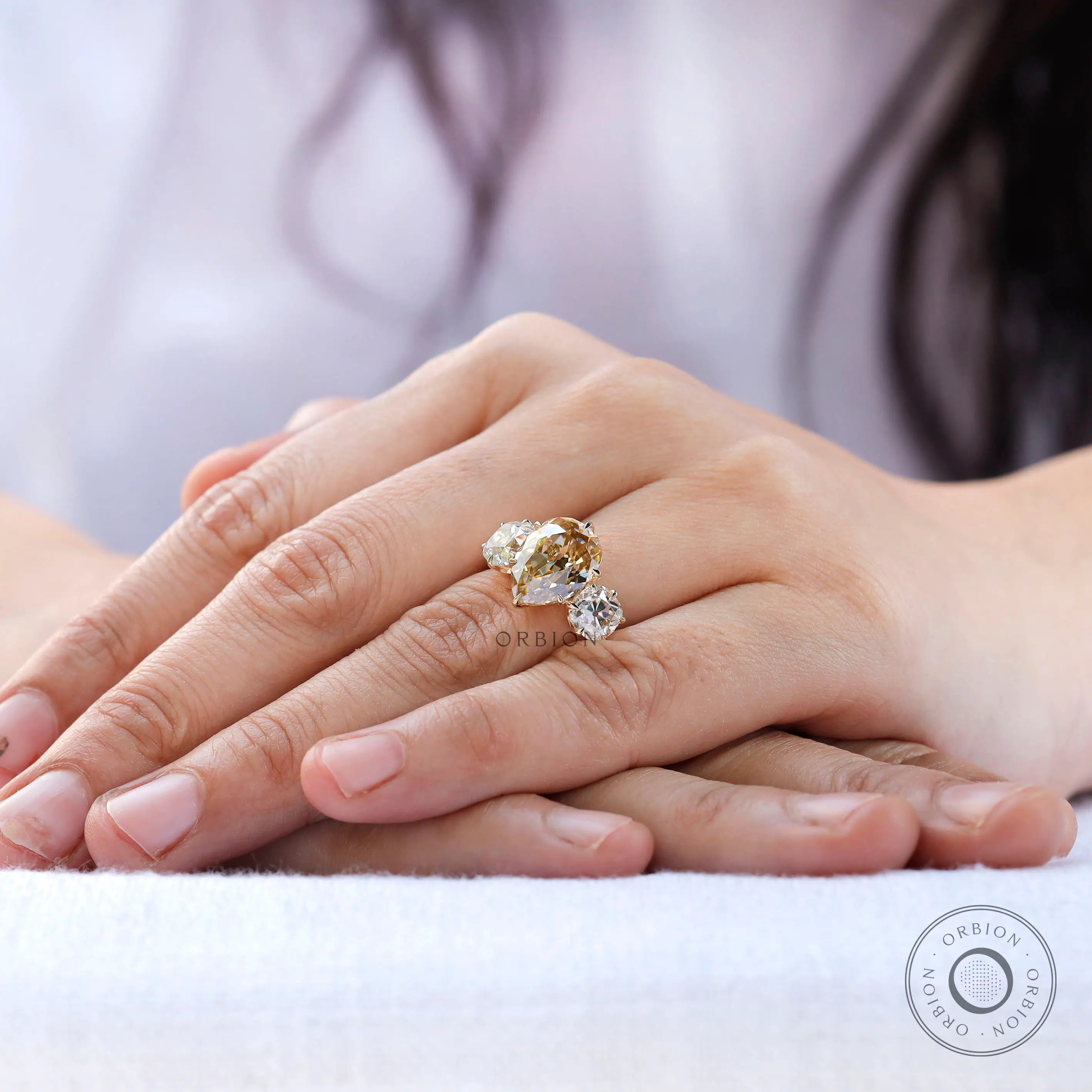 Antique inspired three stone moissanite engagement ring
