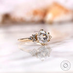Close-up of OEC Moissanite center stone surrounded by Moissanite accents