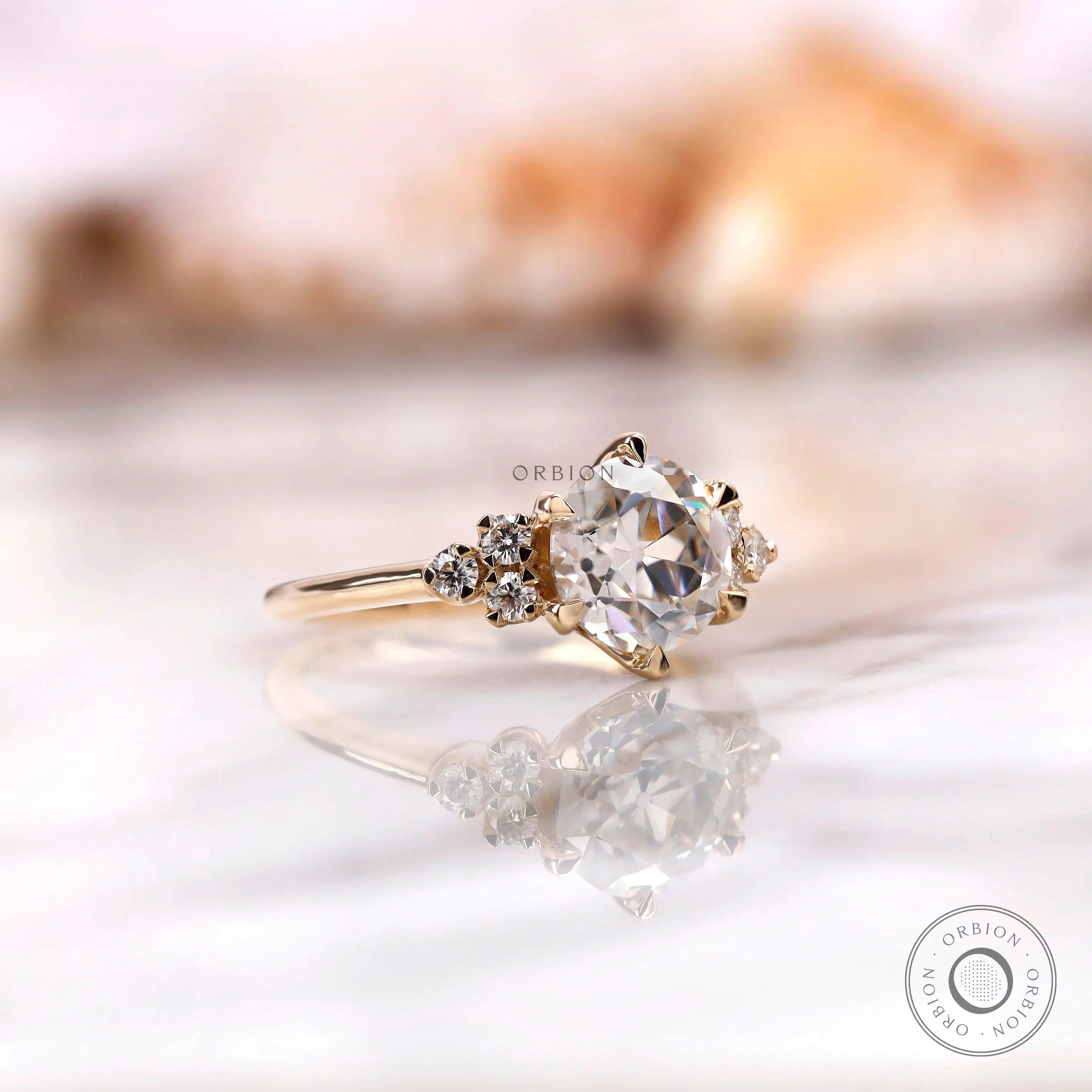 Close-up of OEC Moissanite center stone surrounded by Moissanite accents