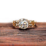 Three stone cushion Old Mine Cut moissanite ring in yellow gold front view