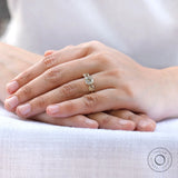 Cushion cut moissanite ring worn on hand lifestyle view