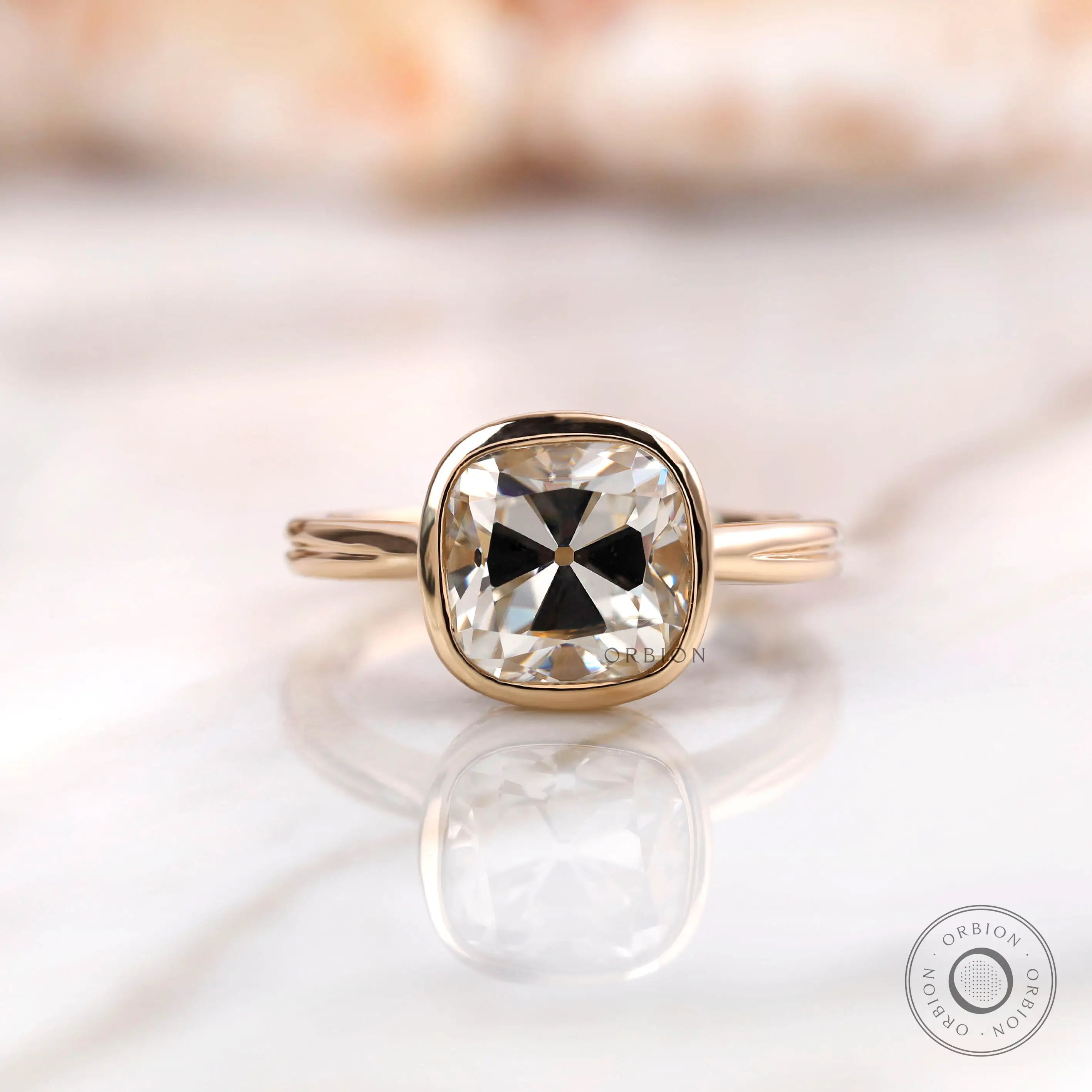 Cushion Old Mine Cut moissanite solitaire bezel ring front view