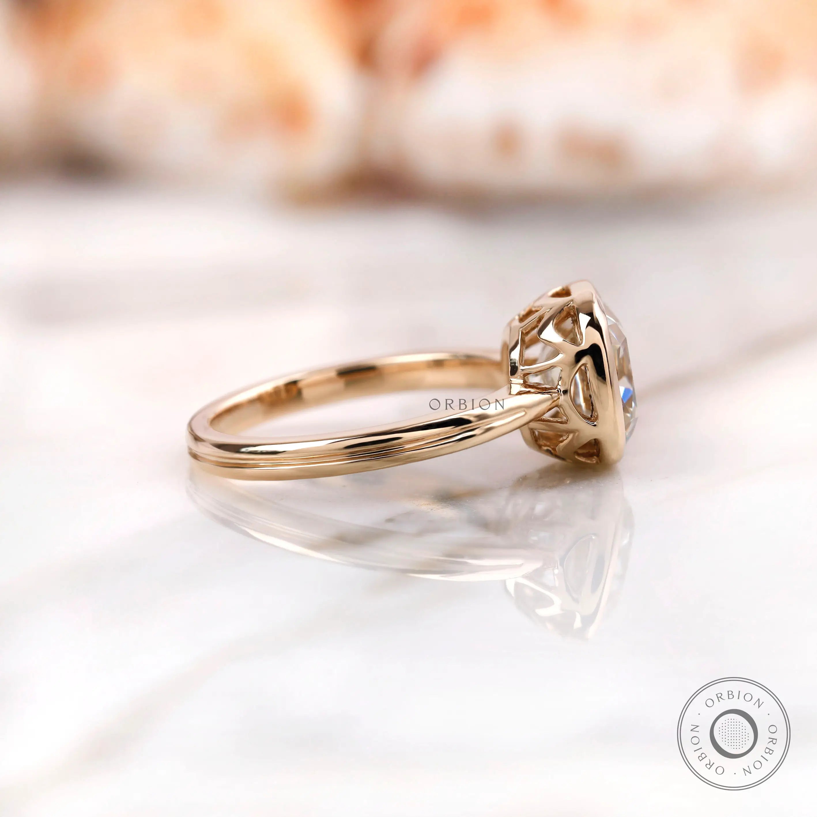 Side profile of cushion Old Mine Cut moissanite bezel ring