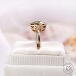Vertical side view of cushion moissanite bezel solitaire ring