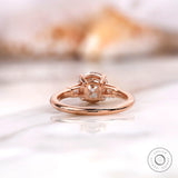 Rear under-gallery view of three stone moissanite ring