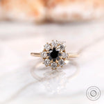 Front view black moissanite halo cluster ring in yellow gold