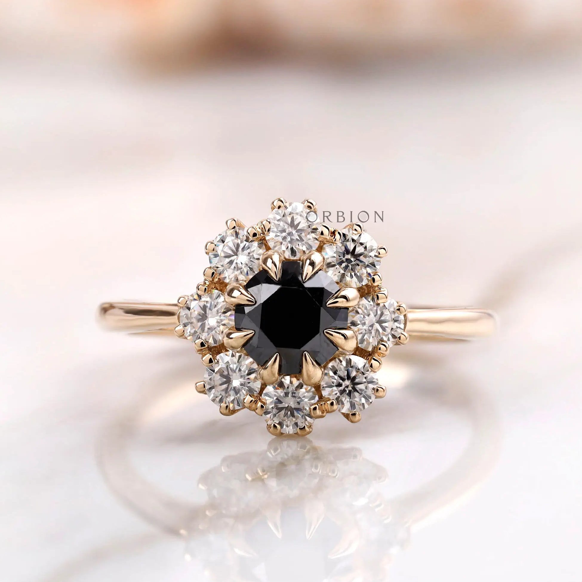 Front view black moissanite halo cluster ring in yellow gold