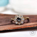 Round Old European Cut black moissanite halo ring in yellow gold front view
