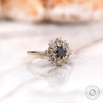 Angled front view black Old European cut halo ring